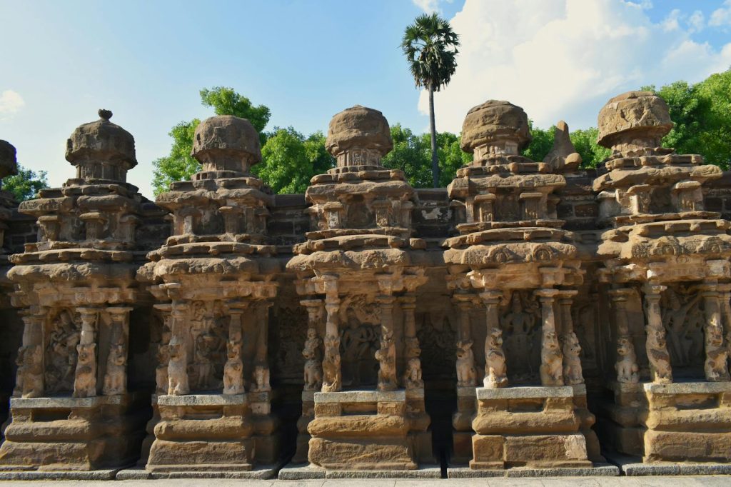 Detailed view of ancient Indian temple architecture with intricate stone carvings.